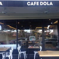 Foto tirada no(a) Cafe Dola por Andy C. em 12/30/2015