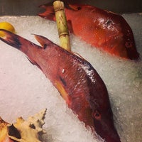 Снимок сделан в Fish Fish Restaurant, Bar, &amp;amp; Market пользователем DiningOut 8/15/2014