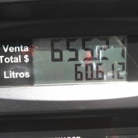 Photo taken at Gasolinería by Alejandro G. on 12/19/2012