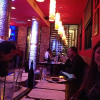Photo taken at Lava Asian Grill by Jonathan G. on 10/28/2012