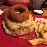 Photo taken at Red Robin Gourmet Burgers and Brews by Norman F. on 12/14/2015