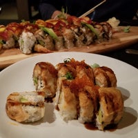 Photo taken at Okura Robata Sushi Bar and Grill by Andrea C. on 1/1/2019