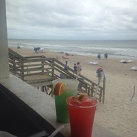 Photo taken at Molly&amp;#39;s Beachside Bar &amp;amp; Grill at the DoubleTree by Hilton Pier by Chris T. on 8/25/2014