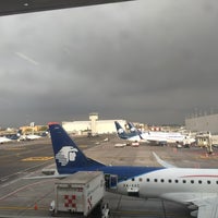 Photo taken at Gate 75 by Lucy M. on 10/10/2018