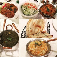 Photo taken at Utsav Indian Cuisine by Cynthia C. on 7/24/2015