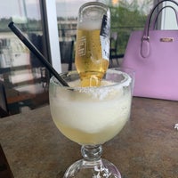 Photo taken at Kingfishers Waterfront Bar + Grill by Calvin A. on 8/7/2020