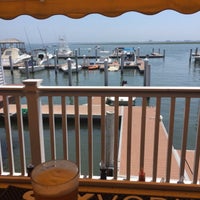 Photo taken at Tavern On The Bay by Mike B. on 7/8/2016