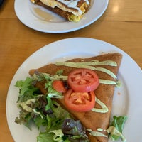 Photo taken at Tandem Creperie and Coffeehouse by Emma on 5/11/2021