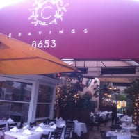 Photo taken at Cravings by ROSSİ BARBAROSSA ASMALİMESCİT T. on 10/12/2012