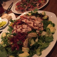 Photo taken at California Pizza Kitchen by Yng L. on 12/12/2015