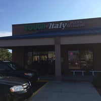 Photo taken at Touch Of Italy Pizzeria by Eve V. on 6/9/2014