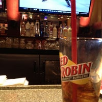 Photo taken at Red Robin Gourmet Burgers and Brews by Harley A. on 2/9/2013