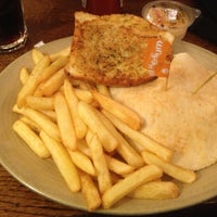 Photo taken at Nando&#39;s by Charlie W. on 12/1/2012