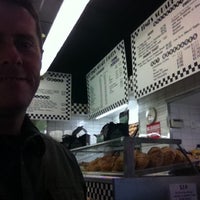 Photo taken at Times Square Hot Bagels by Nick M. on 10/18/2012
