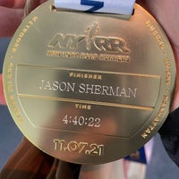 Photo taken at NYC Marathon Finisher Store by Jason S. on 11/8/2021