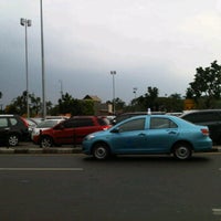 Photo taken at Parking Area Terminal 1A by Chinmi on 11/21/2012