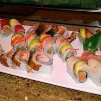 Photo taken at Sushi Koji by Sam G. on 9/28/2012