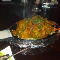 Photo taken at Mantra Indian Cuisine &amp; Bar by Doug B. on 12/16/2012