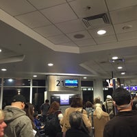 Photo taken at Gate 21 by Wilfred W. on 1/17/2015