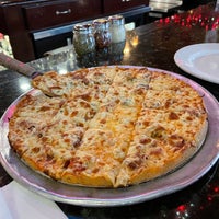 Photo taken at Pizano&amp;#39;s Pizza by Thomas S. on 4/12/2024