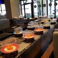 Photo taken at Sushi Train by Derek F. on 8/12/2018