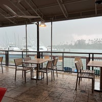 Photo taken at Outriggers Tiki Bar and Grille by Dawn F. on 3/13/2023