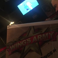 Photo taken at Wings Army by Jonathan G. on 12/23/2016