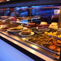 Photo taken at Ganda Restaurant by Lydia on 11/19/2012
