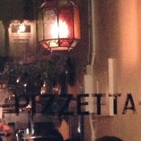 Photo taken at Pizzetta 211 by Amy B. on 4/19/2013