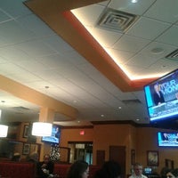 Photo taken at Sporting News Grill by TimelessLisa M. on 12/8/2012