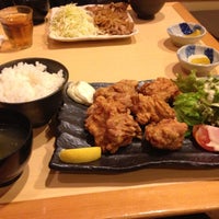 Photo taken at 居酒屋くぅちゃん by Kogoh M. on 10/26/2012