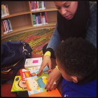 Photo taken at New York Public Library - Washington Heights Library by Rasuwl W. on 3/15/2014