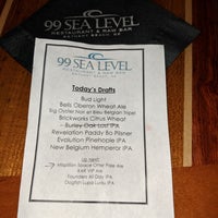 Photo taken at 99 Sea Level Restaurant &amp;amp; Raw Bar by Stacy M. on 5/26/2018