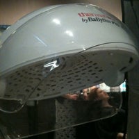 Photo taken at Helmet Hairworx by Mandy D. on 12/15/2012