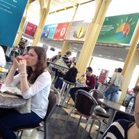 Photo taken at Food Court Seating Area by Emilie A. on 4/11/2014