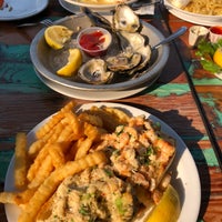 Photo taken at Riva Fish House by Wes M. on 8/7/2021