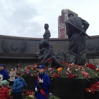 Photo taken at Monument to the Heroic Defenders of Leningrad by Alena Y. on 5/9/2013