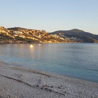 Photo taken at Kalkan Beach by Alper Hamit K. on 5/23/2017