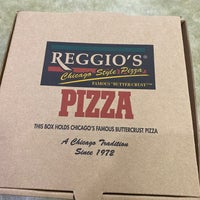 Photo taken at Reggio&amp;#39;s Pizza Express by Rodrigo A. on 3/15/2022