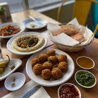 Photo taken at Aviv Hummus Bar by Sara C. on 6/9/2022