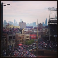 Photo taken at Wrigley Rooftops 1038 by Katelyn W. on 5/4/2013