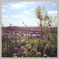 Photo taken at John Lewis Roof Garden by Holly G. on 5/3/2014