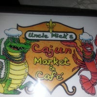 Photo taken at Uncle Mick&#39;s Cajun Market &amp; Cafe by Sherrilovesau N. on 8/10/2014