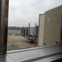 Photo taken at Gate A5 by Sandra R. on 12/16/2012