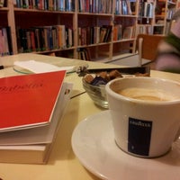 Photo taken at Babèlia Books &amp;amp; Coffee by Priscila n. on 12/15/2012