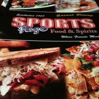Photo taken at Sports Page by Sarah W. on 2/2/2013