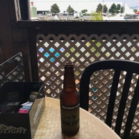 Photo taken at Harborside Bar &amp;amp; Grill by Ricky W. on 6/21/2018