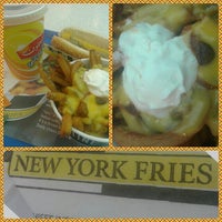 Photo taken at New York Fries by Hazem O. on 8/25/2013