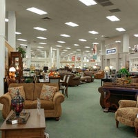 Photo taken at Raymour &amp;amp; Flanigan Furniture and Mattress Store by Logan L. on 4/23/2016