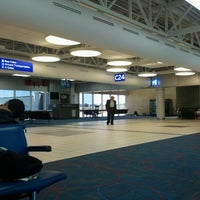 Photo taken at Gate C23 by Kevin T. on 6/6/2012